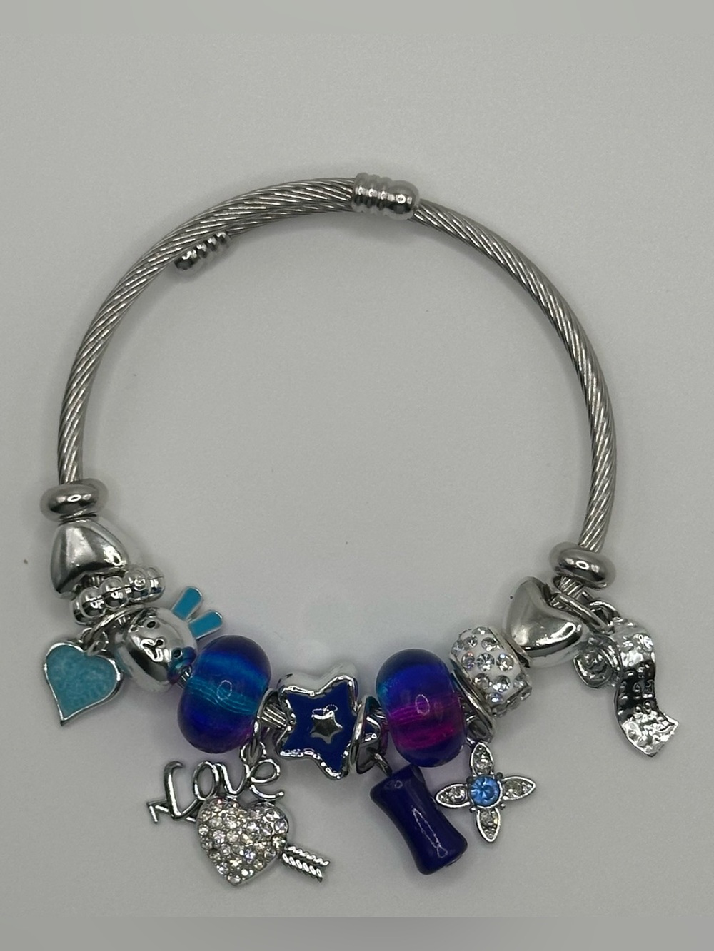 Silver-Tone Womenโs Charm Bracelet with Blue and Purple Beads
